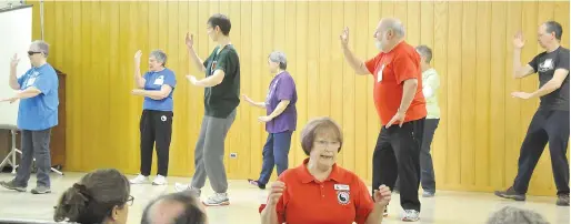  ??  ?? Beginners instructor Elaine Crysler talks about Fung Loy Kok Taoist Tai Chi during an open house for the Moose Jaw branch.