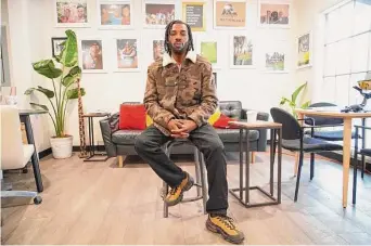  ?? Allen G. Breed/Associated Press ?? Community organizer Chase Madkins poses for a portrait in a Black-owned coffee shop in Memphis, Tenn. Madkins says Black men like he and Tyre Nichols are often pulled over by police own flimsy pretexts hopes of finding some more serious violation.