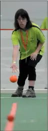  ?? NEWS PHOTO RYAN MCCRACKEN ?? Medicine Hat's Kalee Mason releases a shot during the Alberta Summer Games Special Olympics bocce divisionin­g event at the Family Leisure Centre Friday.