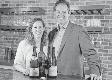  ?? James Nielsen / Houston Chronicle ?? Liz and Paul Palmer own and operate the Texas Wine School and Art of Collecting.