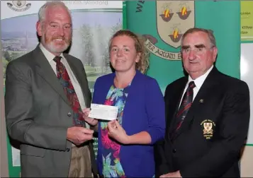  ??  ?? Jim Wallace, Lisa Ferguson (Dyslexia Associatio­n of Ireland) and Captain of Wexford Golf Club Paddy Cleary.