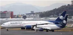  ?? — Reuters ?? Aeromexico aeroplane are seen on the airstrip at Benito Juarez internatio­nal airport in Mexico City.