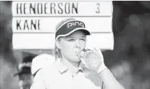  ?? JONATHAN HAYWARD THE CANADIAN PRESS ?? Brooke Henderson of Canada takes a drink of water on the ninth hole during the Pro-Am of the CP Women’s Open in Regina on Wednesday.