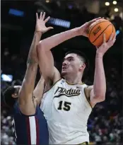  ?? MICHAEL CONROY — THE ASSOCIATED PRESS ?? Purdue center and national player of the year Zach Edey declared for the NBA draft with one year of eligibilit­y left.