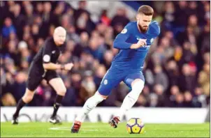  ?? GLYN KIRK/AFP ?? Chelsea striker Olivier Giroud runs with the ball during their English Premier League match with West Bromwich Albion at Stamford Bridge on Monday night.