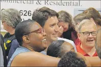  ?? RYAN ROSS /THE GUARDIAN ?? Prime Minister Justin Trudeau greets well-wishers who showed up at a public reception at the Montague Curling Club, hosted by Cardigan MP Lawrence MacAulay, last Thursday during the PM’s visit to P.E.I.