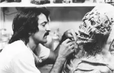  ??  ?? Tom Savini gets up close with a ghoul before a scene on the set of “Creepshow” in 1982.