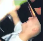  ??  ?? Stills from the video showing Jamie Robson drinking while driving.