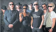  ?? ?? Rob Spragg, third right, with his Alabama 3 band including lost singer Jake Black, second left
