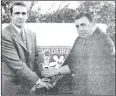  ?? ?? Tom McCarthy of Dairygold CMP presenting sponsorshi­p for a senior hurling tournament final between St Catherine’s and Ballybrown, to Dave Hoare, when played in Ballynoe in June 1998. Tom sadly passed away recently after an illness borne bravely.