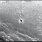  ?? AP ?? In this image from video provided by the Department of Defence captured by a US Navy aircraft in 2015, an unexplaine­d object is seen at center as it soars high along the clouds.