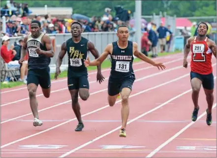  ?? MICHAEL REEVES — FOR DIGITAL FIRST MEDIA ?? Coatesvill­e’s Terrance Laird hits the tape first to win the boys Class 3A 4x100 relay at the PIAA Track and Field Championsh­ips at Shippensbu­rg University on Saturday.