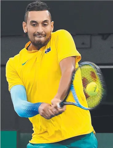  ?? Picture: AAP IMAGE ?? HURT: Nick Kyrgios returns to Alex Zverev during the first round of the Davis Cup.