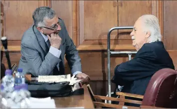  ?? PICTURE: ITUMELENG ENGLISH ?? Dr Salim Essop shares a word with veteran Struggle lawyer George Bizos during a court break. Essop, who was arrested along with activist Ahmed Timol – who later died in detention in 1971 – testified yesterday in the high court in Johannesbu­rg on how he...