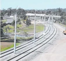  ??  ?? A newly completed section of the light rail line in Helensvale.