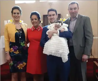  ??  ?? Amelia Maria Finan on her Christenin­g Day in Ballyrush Church with her parents Amanda and Kieran Finan and Godparents Emma Gallagher and Noel Finan.