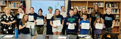  ?? PILOT NEWS GROUP PHOTO/ANGELA CORNELL ?? of these students were presented to the board for outstandin­g accomplish­ments throughout the year. Pictured here, from left to right, back Row: Mrs. Melissa Duerksen, Caden Christy, Isabelle Bau, Rowan Scameheorn, Ryan Carmichael, Chloe Shock, Madelynne Geraghty, Sydney Mrs. Marylynn Christy, and Connor Mitchell. Front Row: Abby Nace, Sydney Groves, Colton Milliser, Lucas Maenhout, and Maisy