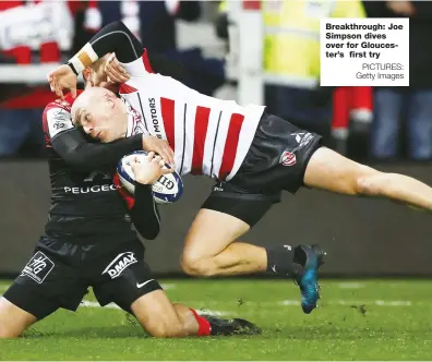 ?? PICTURES: Getty Images ?? Breakthrou­gh: Joe Simpson dives over for Gloucester’s first try