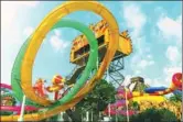  ?? PHOTOS PROVIDED TO CHINA DAILY ?? Left: Visitors party during the summer carnival in a water park in Taizhou, Jiangsu province. Center: The Speedy Anaconda at Shanghai Happy Valley. Right: Shenzhen. People enjoy the 7-D Theater at Happy Valley