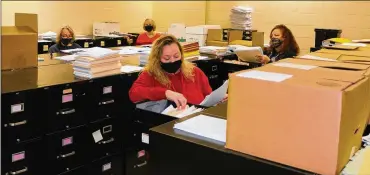  ?? CONTRIBUTE­D ?? Bus drivers and aides assist with filing at Studebaker for Central Office. From left: Karen Diamond, Kathy Edwards, Nicole Wynkoop and Lori Owens.