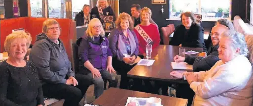  ??  ?? The Waspi Burscough and Surroundin­g Areas Group’s inaugural meeting with Rosie Cooper at the head of the table and organiser Jeannie Pritchard, fourth from left