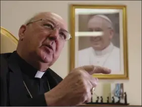  ?? AP PHOTO/PAOLO SANTALUC ?? Cardinal Kevin Farrell, head of the Vatican’s family and laity office, talks during an interview with The Associated Press in office in Rome, on Tuesday. The highest-ranking American at the Vatican insists he never even suspected his former boss...