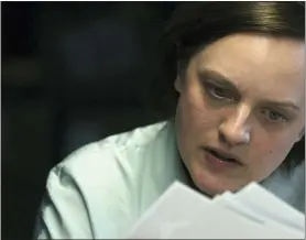  ?? ?? Elisabeth Moss in “Shining Girls,” streaming on Apple TV+.