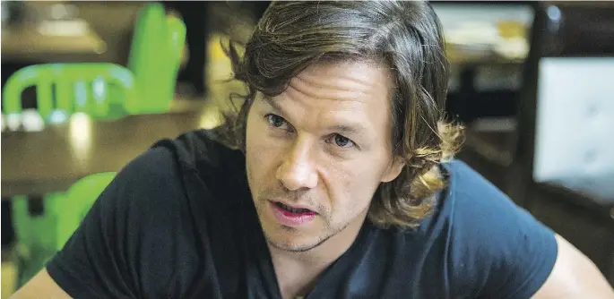  ?? ERNEST DOROSZUK / TORONTO SUN / POSTMEDIA NETWORK ?? Actor Mark Wahlberg, pictured during an interview at Toronto’s Wahlburger­s restaurant (where he is part owner), plays an oil-rig technician­in Deepwater Horizon, a project about the devastatin­g 2010 oil spill off the Louisiana coast.