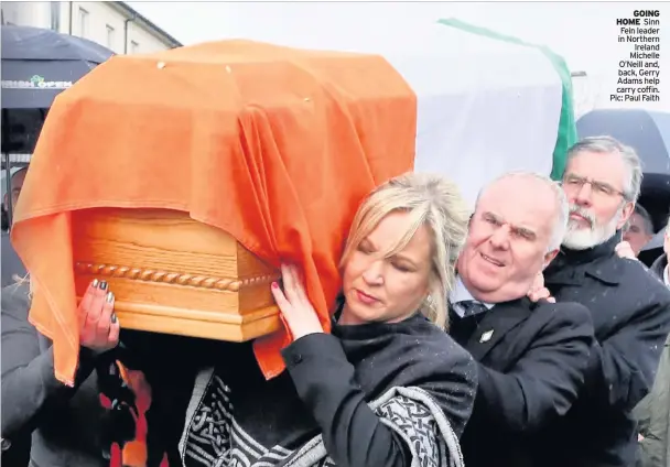  ??  ?? GOING HOME Sinn Fein leader in Northern Ireland Michelle O’Neill and, back, Gerry Adams help carry coffin. Pic: Paul Faith