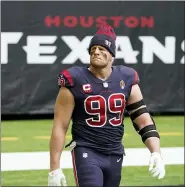  ?? ASSOCIATED PRESS FILE ?? Texans defensive end J.J. Watt walks on the field before a game against Cincinnati last December. Watt and the Texans mutually agreed to part ways, making Watt a free agent, where he will be a highly coveted player this offseason.