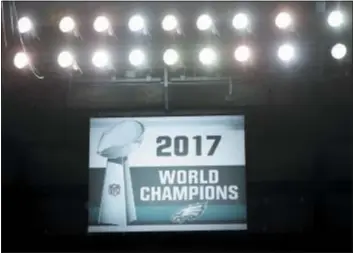  ?? MATT ROURKE — THE ASSOCIATED PRESS ?? After a weather delay, the Eagles got to unfurl their Super Bowl LII banner prior to Thursday night’s 18-12 season opening victory over the Atlanta Falcons at Lincoln Financial Field.