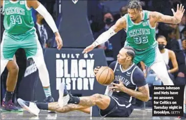  ?? GETTY ?? James Johnson and Nets have no answers for Celtics on Tuesday night in Brooklyn.