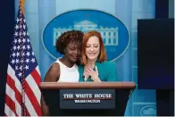  ?? The Associated Press ?? ■ White House press secretary Jen Psaki hugs incoming press secretary Karine Jean-Pierre during a May 5 press briefing at the White House in Washington. Psaki, whose last day on the job is Friday, has answered reporters’ questions nearly every weekday of the almost 500 days that Biden has been in office.