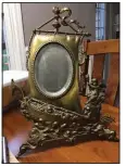  ??  ?? This exuberant and uncommon piece — “Meriden Quadruple Silver Plate” — was likely intended to be a picture frame.
(TNS)