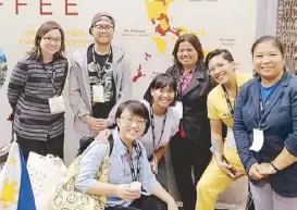  ??  ?? Brooklyn-based Mt. Province Café owner Ray Luna and San Francisco-based Andytown Roasters’ Corazon Padilla (second and fourth from left) visit the Philippine booth.