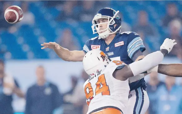  ?? FRANK GUNN/THE CANADIAN PRESS ?? Khreem Smith and the B.C. Lions disrupted Toronto Argonauts quarterbac­k Ricky Ray all night Friday in Ray’s first game action of the season. The result was a big victory for B.C.