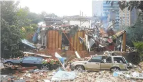  ?? PHOTO BY SERGEANTS BENEVOLENT ASSOCIATIO­N VIA THE NEW YORK TIMES ?? A building was destroyed by an explosion in the Kingsbridg­e neighborho­od of the Bronx on Tuesday. One firefighte­r was killed and at least 12 other people were injured.