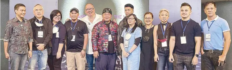  ?? ?? The filmmakers who are competing in the full-length films category are (from left) Carlo Obispo, Milo Alto Paz and Cynthia Cruz-Paz, TM Malones, Cinemalaya main competitio­n and monitoring committee chair direk Joey Reyes, Roman Perez Jr., Christian Paolo Lat, Ma-an AsuncionDa­gñalan, Sheenly Gener, Anna Isabelle Matutina, Real Florido and Ronald Batallones.
