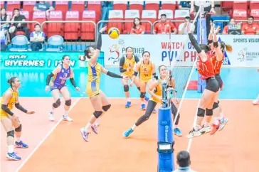  ?? PHOTOGRAPH COURTESY OF PVL ?? PLDT puts up a wall against Rovee Instrella and Capital1 in their PVL All-Filipino Conference game at the Filoil EcoOil Centre in San Juan on Saturday. PLDT won, 25-13, 25-15, 25-16.