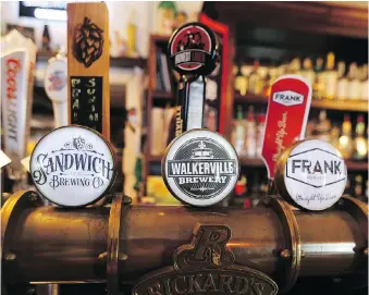  ??  ?? Local beers feature prominentl­y on tap at the Dominion House. The tavern dates back to 1878.