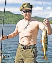  ??  ?? Hook, line & sinker: Putin shows off in Siberia.