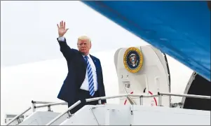  ?? AP PHOTO ?? President Donald Trump waves as he boards Air Force One at Love Field in Dallas, Friday, after speaking to the annual National Rifle Associatio­n convention.