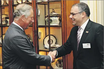  ??  ?? Unshakeabl­e approval: Prince Charles with the World Jewish Relief chair, James Libson, at Clarence House