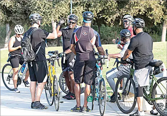  ?? PHOTOS BY ROD THORNBURG / FOR WEST SIDE WEEKLY ?? Cyclists get ready to hit the bike trail at The Park at River Walk on Sept. 19.