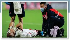  ?? ?? Agony: Will Addison receives treatment last night