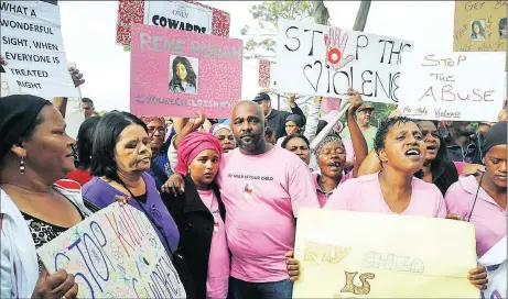  ?? Picture: BERTRAM MALGAS ?? INCONSOLAB­LE: The parents of Rene-Tracy Roman, Chrissandr­e and Marvin Jacobs (centre) stand among protesters, gathered outside the Wynberg Magistrate’s Court where the man accused of her rape and murder made his second court appearance.
