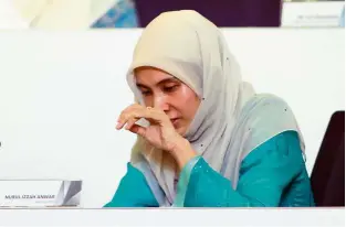  ??  ?? Emotional: Nurul Izzah crying after delivering her speech at PKR’s national congress at IDCC in Shah Alam.