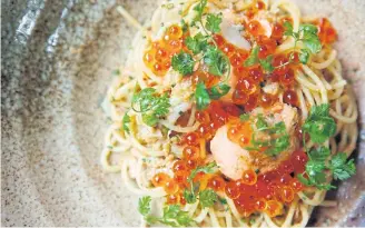  ??  ?? Spaghetti with salted fish, crab and pecorino.