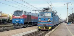  ?? ?? Right: Engine change at Arys, Kazakhstan, with GE diesel TE33A 0176 replaced by former Soviet Railways double electric VL80 1858 for the run to the Uzbek border with the Moscow to Tashkent internatio­nal train on February 17, 2020.