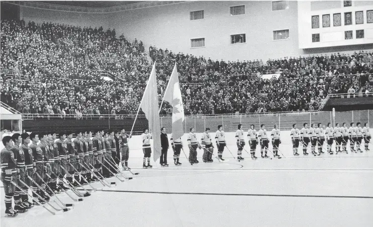  ?? — UBC ARCHIVES ?? Players stand at attention during the opening ceremonies of a game in Beijing during the UBC Thunderbir­ds’ 1973 hockey friendship tour of China.